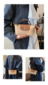 Bolso cruzado chic para mujer con textura de ante y solapa de cuero marrón para diario.