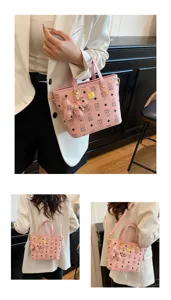 Pink bucket bag for women, stylish leather handbag with cute bear print and crossbody design.