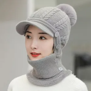 Cozy grey winter knitted hat with visor and integrated fleece-lined neck warmer detail.