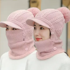 Pink knitted winter hat with visor, ear flaps, and integrated neck warmer for cold weather.