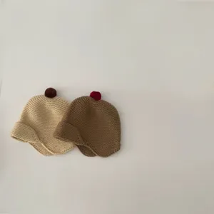 Toddler cute knit baby ear protection hat, warm winter solid color beanie with pom pom detail.