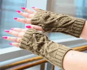 Detailed view of cable knit arm warmers, winter warm stretchy gloves in khaki color.