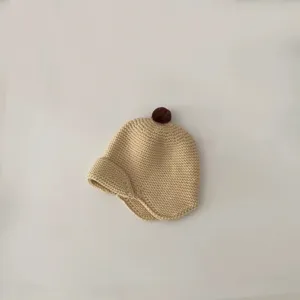 Toddler knit beanie hat with cute brown pompom warm winter earflap baby cap cream color