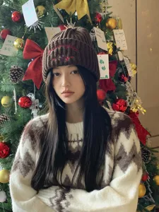 Cute brown knitted beanie for women, warm winter woolen hat with cute bear embroidery and chic style.