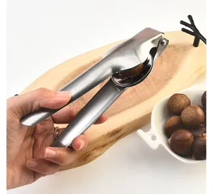 Stainless steel chestnut opener tool, ergonomic nutcracker for easy shell removal of nuts.