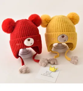 Cute baby winter knit hat with double pom poms bear face and earflaps for toddlers kids