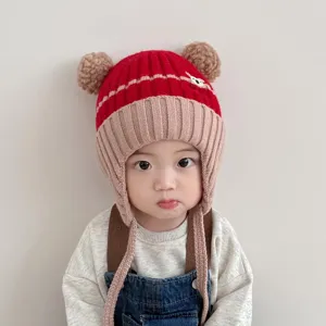 Winter baby knitted hat with cute pom pom and earflaps for warm toddler daily wear cozy