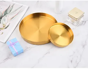 Nordisches Luxus Gold Edelstahl runde Aufbewahrungstabletts fuer Kosmetik und Schmuck.