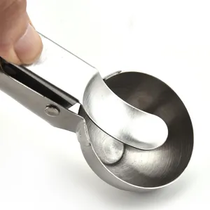 Stainless steel ice cream scoop with trigger release mechanism for kitchen baking and dessert tools.
