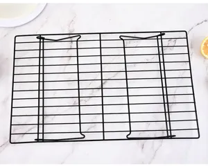 Detailed view of the black 3-tier folding cooling rack for baking, cakes and cookies.