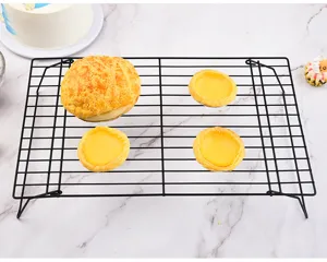 Black metal wire cooling rack detail, grid design for baking pastry cooling mesh and support.