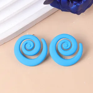 Bright blue swirl acrylic earrings, modern geometric statement ear studs for trendy daily wear.