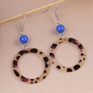 Retro European acrylic leopard print drop earrings with blue beads, stylish jewelry.