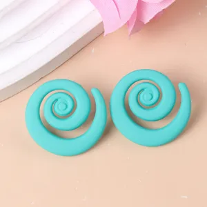 Candy color spiral acrylic stud earrings, geometric design fashion jewelry for women detail shot.