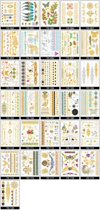 Vista dettagliata di vari adesivi per tatuaggi temporanei metallici oro e argento.