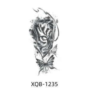 Black and white tiger eye temporary tattoo sticker, artistic half arm body art design for men.