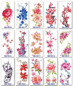 Detail view showing various floral temporary tattoo stickers with roses and butterfly designs.