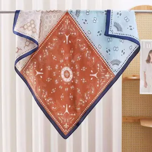 Chic 90cm square silk scarf featuring a vintage paisley patchwork and Eiffel tower design.