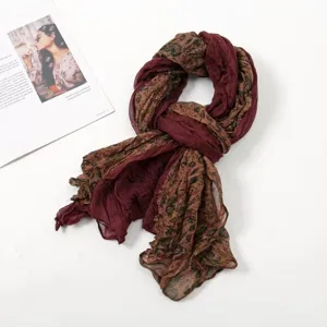 Detailed view of a vintage floral print voile scarf, lightweight and versatile for all seasons.