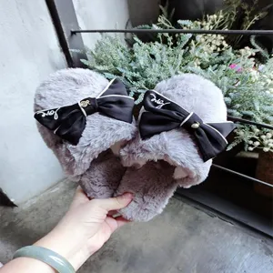 Korean style women soft fluffy slippers with elegant black bow, cozy indoor cotton shoes