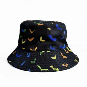 Close-up detail of the black bucket hat with colorful bat print, showcasing fabric texture.