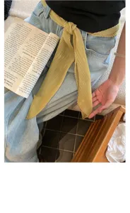 Yellow pleated silk-like long scarf ribbon, stylish waist accessory and neckerchief for women.