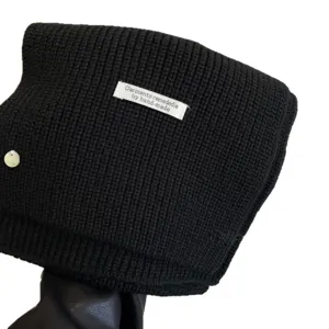 Solid black knit winter scarf for women and men, warm cozy casual neck warmer collar.