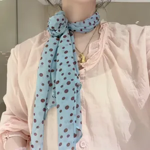 Blue polka dot silk scarf, elegant long hair band and stylish neck accessory for women.