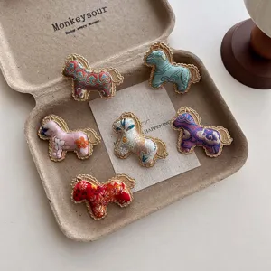 Exquisite Chinese style Song brocade pony brooch detail, elegant traditional fashion pin.