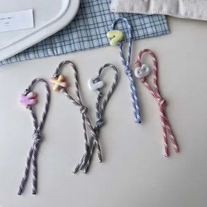 Detail view of Miu style candy color letter bead braided lanyard keychain, cute and stylish.