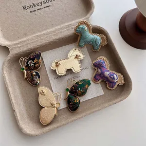 New Chinese style Song brocade horse and butterfly brooch pin, exquisite vintage fashion accessory.