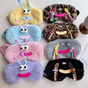 Cute plush sleep mask, funny cartoon blindfold with antennas and soft cozy plush texture.