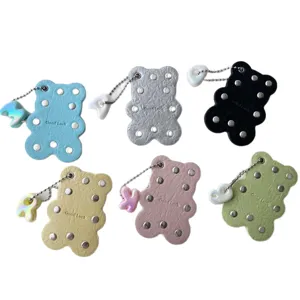 Cute cartoon leather bear keychain with metal studs and letter charm bag pendant accessory