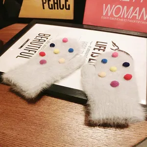 Cute fuzzy rabbit hair mittens with colorful pom poms, warm winter gloves for women.