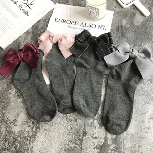 Women cotton socks with cute bowknot detail, stylish design for daily wear and matching.