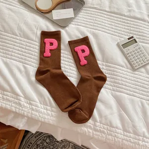 Brown mid-tube socks with pink embroidered letter P patch, cozy warm towel loop cotton slouch socks.