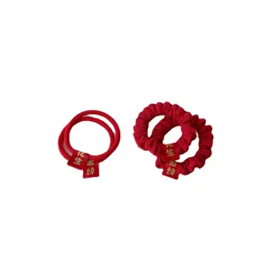 Red Chinese style hair scrunchies set, festive New Year hair ties for women and girls.
