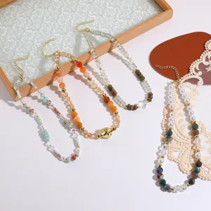Detailed close-up of colorful crystal beaded necklaces showing exquisite craftsmanship and design.