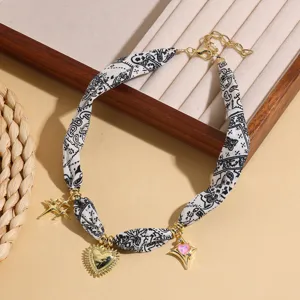 Fashion printed silk scarf necklace with fabric choker and multi charms for women daily wear.