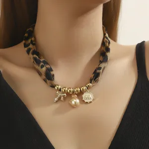 Chic leopard print fabric necklace with gold beads pearls and charms for women fashion style