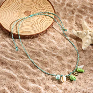 Boho beach blue braided rope necklace with seashell and green fish pendants for women summer.