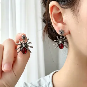 Vintage Gothic red zircon spider drop earrings for women, detailed metal web design jewelry.