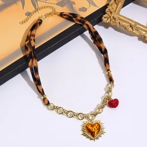 French retro leopard print silk scarf spliced metal necklace with sun and heart pendant detail