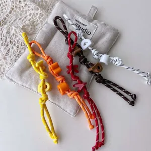 Handmade braided rope charm with letter beads, stylish bag pendant and car hanging.