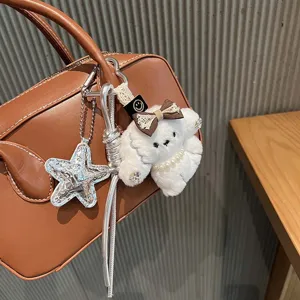 Cute plush puppy bag charm with pearl and star pendant for Korean style handbags.
