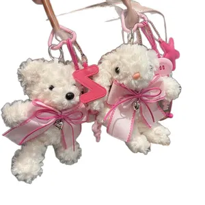 Niedlicher Plüsch Bär und Hase Taschenanhänger mit rosa Schleife, Autoschlüssel.
