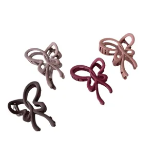 Matte irregular bow hair claw clips set, large shark clips for thick hair styling accessories.