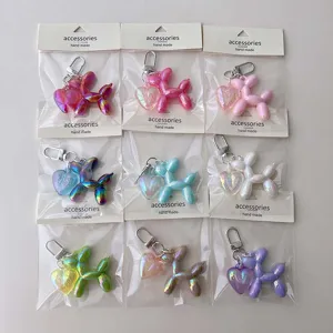 Colorful acrylic balloon dog and heart keychain pendants, mini DIY bag charms and accessories.