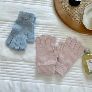 Cozy knit touchscreen gloves for women, winter warm split-finger gloves in blue and pink.