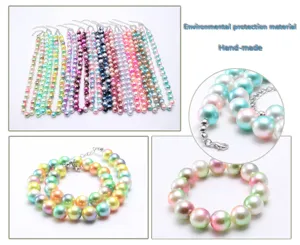 Colorful imitation pearl beaded necklace detail shot, handmade multi-color gradient design.